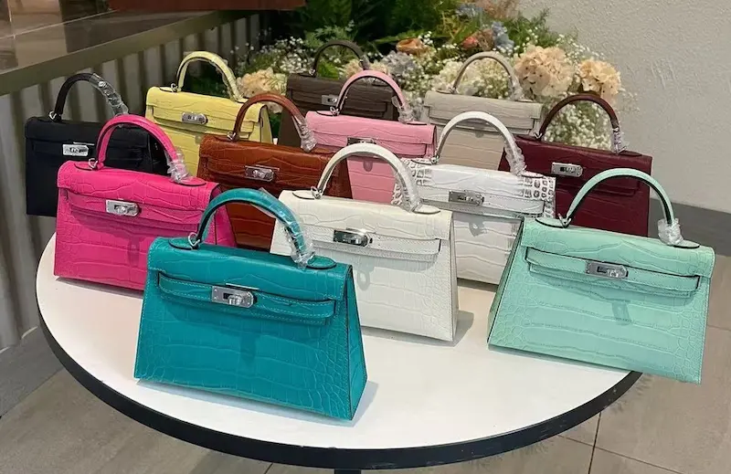 Luxury replica Hermes Kelly 19cm in black crocodile embossed leather with gold hardware