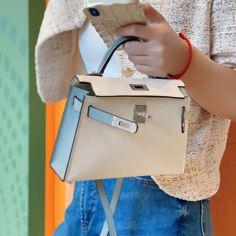 replica hermes kelly 19cm white epsom leather bag worn by model
