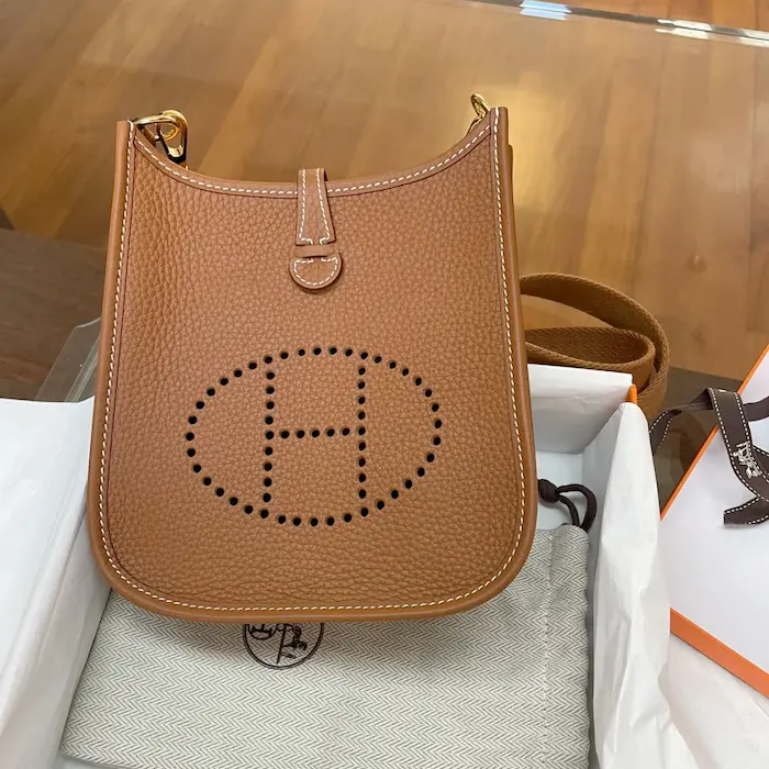 Gold Clemence leather Hermes Evelyne TPM replica unboxing with signature orange box