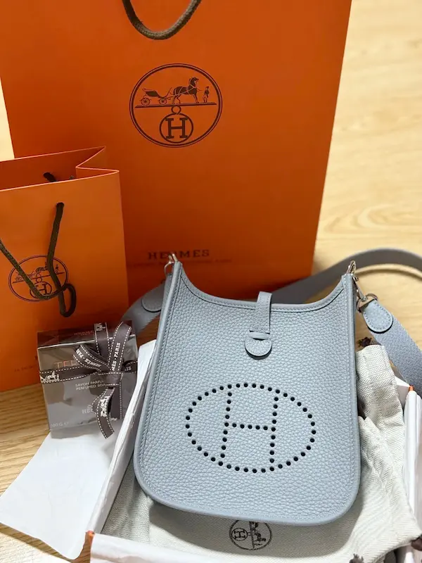 Cobalt blue Hermes Evelyne 16 replica bag unboxing with dust bag