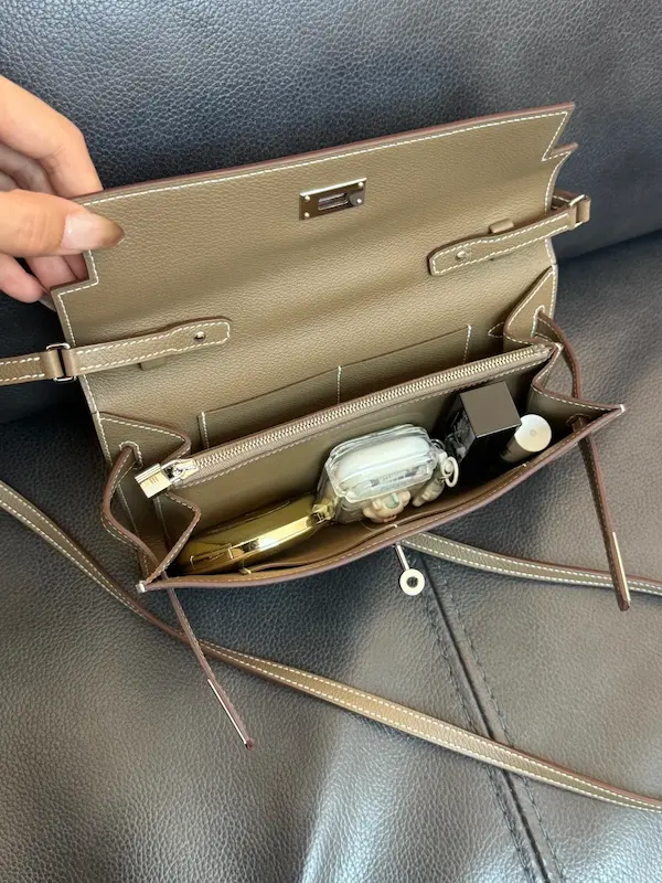 Interior organization of Elephant Grey replica Kelly wallet showing compartments