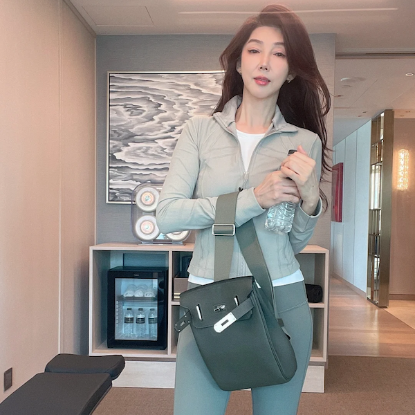 Close-up front view of elephant grey Hermes HAC replica bag with authentic details