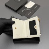 CASSANDRE MATELASSE bi-fold wallet in grain leather