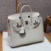 Side profile showing the sturdy silver sangles and plaqué on the best replica Hermes Craie Replica Handbag Store 25.