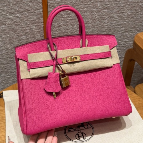 Best replica Hermes Fuchsia Replica Handbag Store 25 with pristine silver hardware on the front clasp