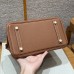 High-quality grained leather texture of the best replica Hermes Gold Replica Handbag Store 25 bag.