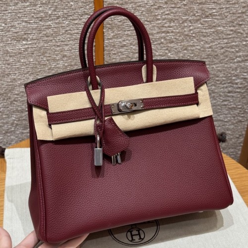 Best replica Hermes Rouge H Replica Handbag Store 25 with pristine silver hardware on the front clasp
