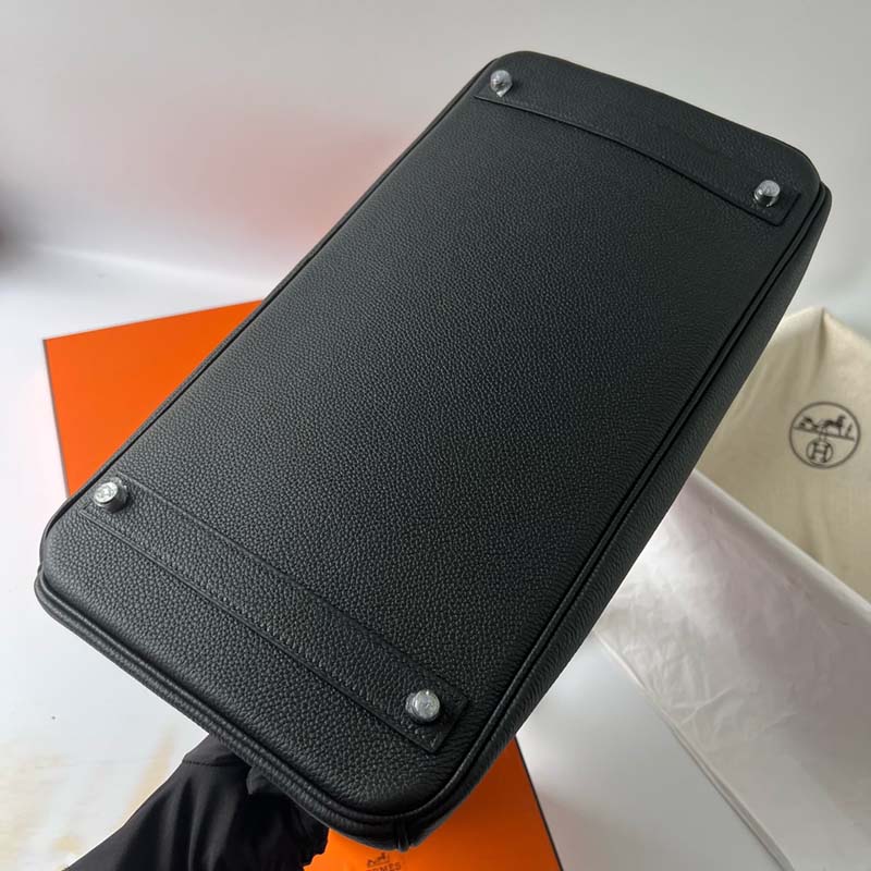 Bottom view of Hermes Replica Handbag Store 40cm showing feet placement and leather base