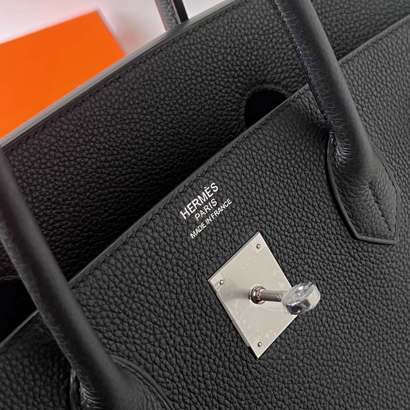 Close-up of Hermes Paris logo stamp on front of Replica Handbag Store 40cm bag