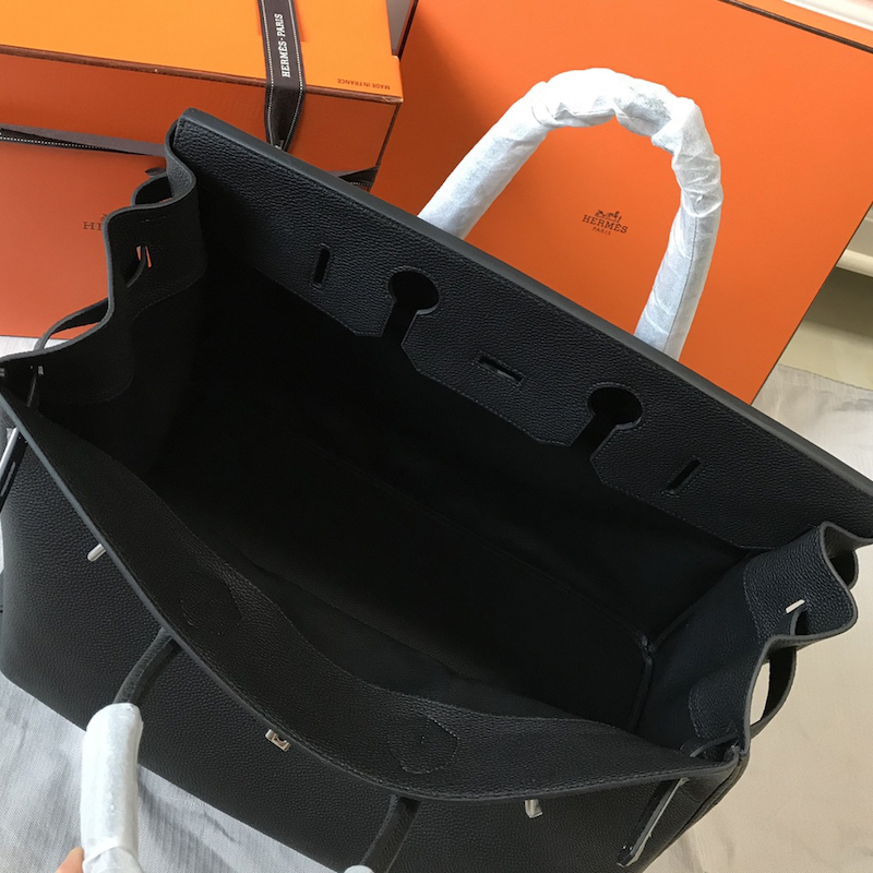 Underside of black Replica Handbag Store 50cm replica with protective palladium feet and corner reinforcement