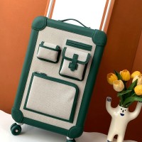 Replica Hermes R.M.S Cargo Cabin Suitcase in green color with iconic hardware.