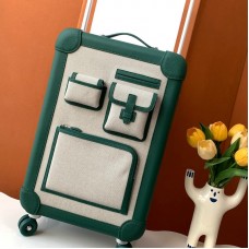 Replica Hermes R.M.S Cargo Cabin Suitcase in green color with iconic hardware.