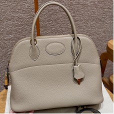 Replica Hermes Bolide 31 Bag in Girs Tourterlle Togo leather with zip-top closure.