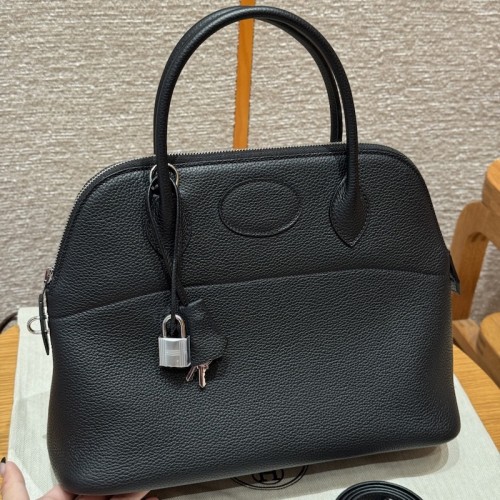Replica Hermes Bolide 31 Bag in black Togo leather with zip-top closure.