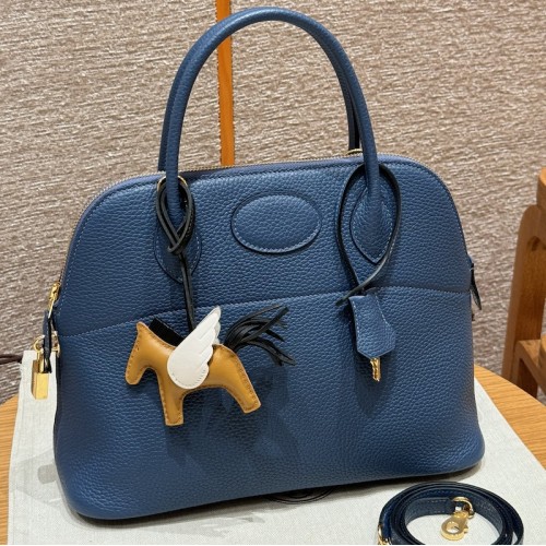 Replica Hermes Bolide 31 Bag in Blue Brighton Togo leather with zip-top closure.