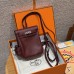 Rouge Replica Hermes Kelly Jump Backpack front view showing iconic buckle closure