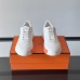 Replica Hermes Bouncing Sneaker side view, white leather with signature H detail