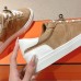 Stitched toe cap detail on Hermes-inspired sneaker