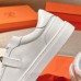 Stitched toe cap detail on Hermes-inspired sneaker